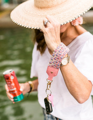 Load image into Gallery viewer, Keep on Cruisin Keychain in Rose on wrist with keys #color_rose