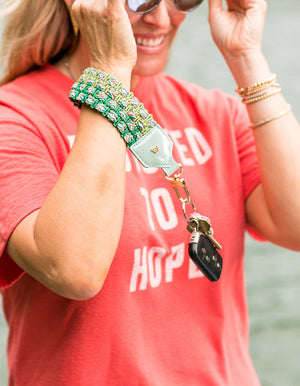 Load image into Gallery viewer, Keep on Cruisin Keychain in Rose on wrist with keys #color_seafoam
