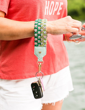 Load image into Gallery viewer, Keep on Cruisin Keychain in Rose on wrist with keys #color_seafoam
