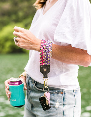 Load image into Gallery viewer, Keep on Cruisin Keychain in Charcoal on wrist with Keys #color_anchor
