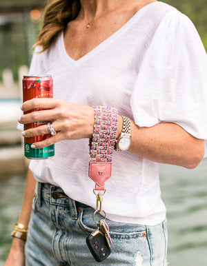 Load image into Gallery viewer, Keep on Cruisin Keychain in Rose on wrist with keys #color_rose
