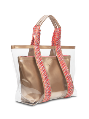 Load image into Gallery viewer, Clear exterior tote large enough to pack all your summer essentials. Waterproof material to make cleaning a breeze. Removable interior pouch made with water resistant vegan leather in champagne gold color #color_champagne
