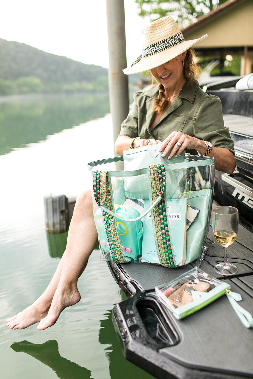 Bring on the beach bag in seafoam, easy to clean exterior tote. 